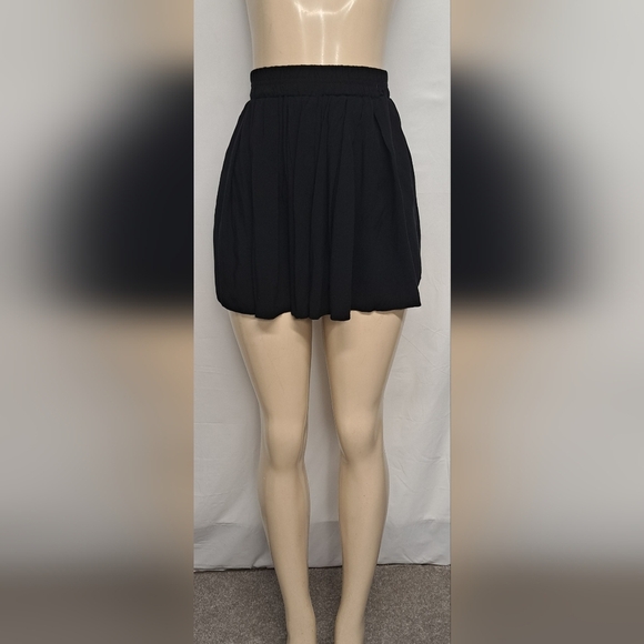 Brandy Melville Dresses & Skirts - Brandy Melville Black Swing Flowy Mini Skirt Elastic Waist Pleated S M